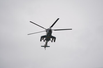 Almaty, Kazakhstan - 04.14.2022 : A military helicopter flies over the training ground during an exercise.