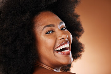 Hair care, black woman and beauty with smile, afro and dental health, white teeth and healthy oral. Happy, cosmetic and skin health of a person with an afro with happiness or content face with joy