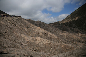 view of steep rocky and sandy hills with clear sky