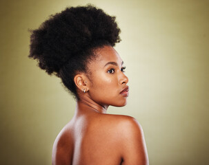 Black woman, afro hair and body skincare glow on green studio background in healthcare wellness,...