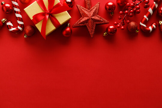 New year background with red ornament decorations on red background.