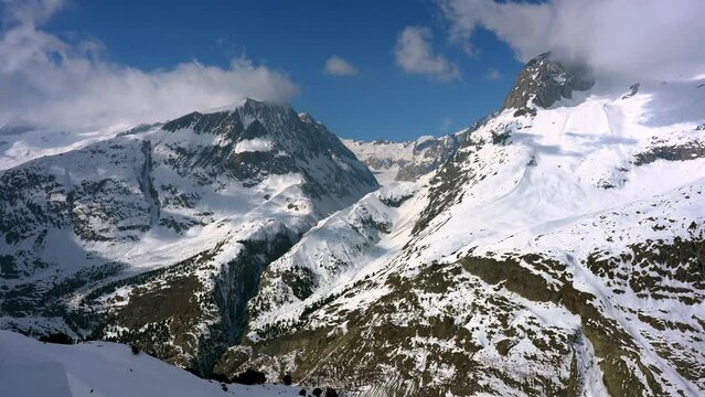 Epic snow-capped mountains in the alps. Swizterland