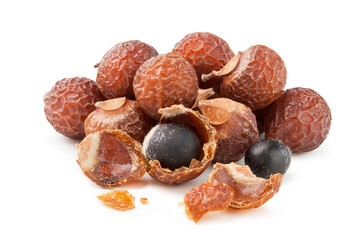 organic soap nuts, sapindus mukorossi seeds on white background.