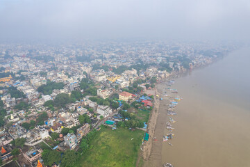 Aerial view of Varanasi city with  Ganges river, ghats, the houses in Varanasi, Banaras, Uttar Pradesh, India