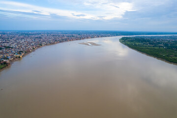 Aerial view of Varanasi city with  Ganges river, ghats, the houses in Varanasi, Banaras, Uttar Pradesh, India