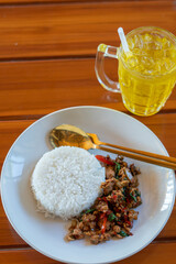 Stir fried Minced pork with basil,fast food Thai Style food. Thailand street food.
 Thailand's national dishes, Thai name is Pad kra prao Mou. famous food in Thailand