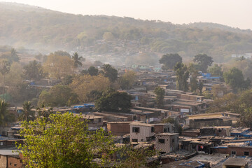 Slums clustered on a hillside on the outskirts of the Borivali National Park in suburban Mumbai.