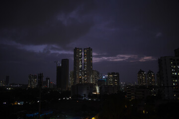 Fototapeta na wymiar Dark skyline of the suburb of Kandivali in the city of Mumbai at night.
