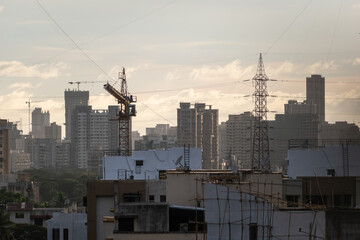 Skyline of suburban Mumbai with tall high rise buildings under construction.