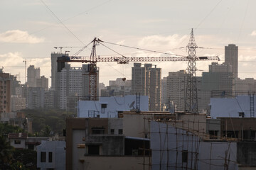 Skyline of suburban Mumbai with tall high rise buildings under construction.