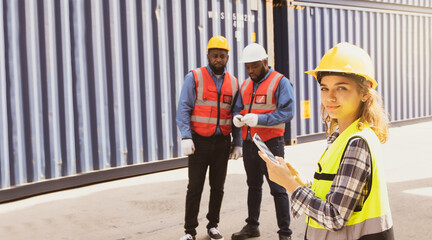 Portrait caucasian female worker container engineering stand smiling posing thumbs up teamwork together african american male worker cooperation multiracial worker logistics team cargo import export.