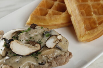 Roast beef with mushroom gravy and waffles