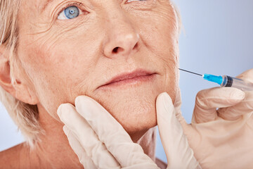 Botox, injection and antiaging with a senior woman in studio on a gray background with hands in...