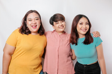 A portrait of three friends are smiling expressing happy feeling, isolated by white background