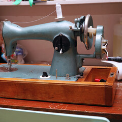 An old manual sewing machine. Selective focus