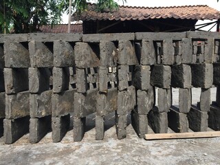 the drying process uses the sun's heat for bricks that have been printed and formed into rectangles