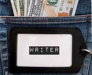 Job ID card holder with text - WRITER - on jeans background with cash dollars money ,concept of...