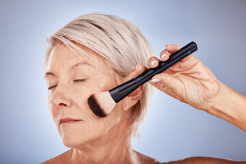Portrait of elderly woman, beauty and makeup brush product cosmetics for natural glow, anti aging skincare and spa treatment. Senior lady, gray studio background and advertising or marketing mockup