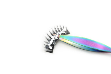 Сoncept of cosmetology tools, false eyelashes, isolated on white background