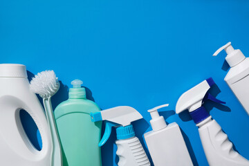 Cleaning supplies tools, white soap packaging, detergents