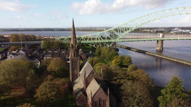 Old town Runcorn All saints church in suburban townhouse residential district aerial view