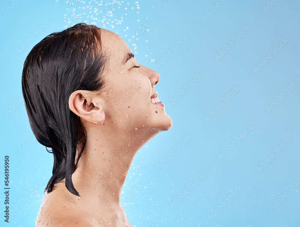 Poster Asian woman, shower and water for cleaning, smile and happy in blue studio mockup background. Model, clean and showering face, body and hygiene, skincare or cosmetic beauty in bathroom with happiness