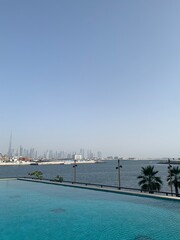 Large infinity pool with a view of the Dubai skyline in the United Arab Emirates