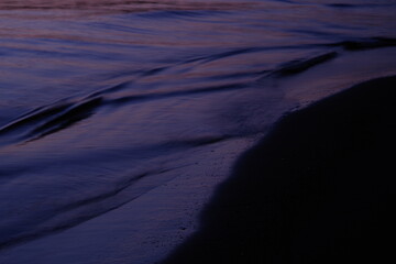 Landscape photo of the coast dyed in purple