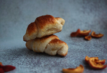 homemade confectionery French croissant on a gray-blue background