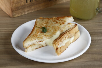 Homemade grilled cheese sandwich with lemonade