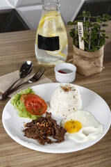Tapsilog, a Filipino breakfast of beef tapa, fried rice and eggs
