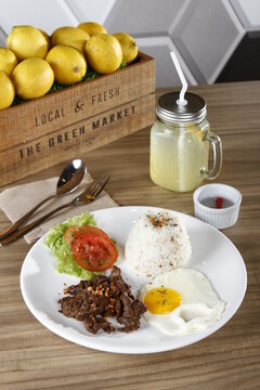 Tapsilog, a Filipino breakfast of beef tapa, fried rice and eggs