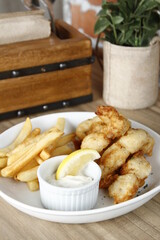 Fish and chips with garlic and lemon dip