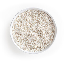 Uncooked arborio rice in white bowl isolated on white background with clipping path