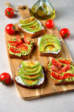 Vegetarian toast with avocado and tomatoes