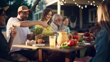 Portrait of a Group of Multiethnic Diverse People Having Fun, Communicating with Each Other and Eating Vegetarian Food Outdoors. Family and Friends Gathered Outside Their Home on Warm Summer Day. - Powered by Adobe