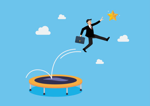 Businessman bounce on trampoline jump flying high to grab star