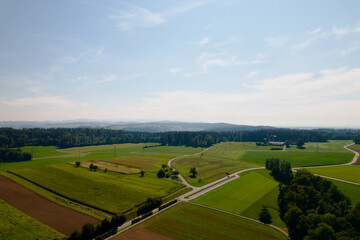 Aerial view of agriculture landscape around rural village of Kyburg, Canton Zürich, on a sunny late summer day. Photo taken September 2nd, 2022, Kyburg, Switzerland.