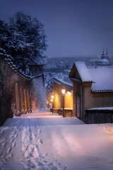 Stairs leading to the Prague Castle covered with snow. Prague. Winter.
