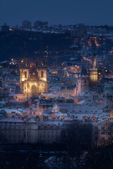 View of centre of Prague and old town square in winter at night. Snow. Travel.