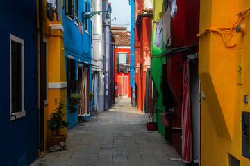 Fototapeta na wymiar Colorful street in Burano village in Venice. Travel. Tourism.
