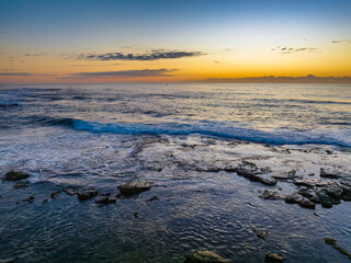 Fototapeta na wymiar Sunrise Seascape at Flat Rock