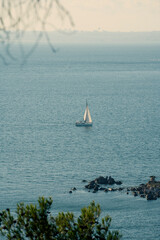 Little yacht sailing on the sea beautiful seascape.
