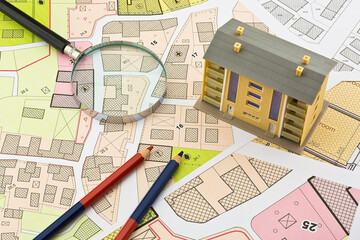 Imaginary cadastral map and general urban plan with cadastral parcels, urban destinations, vacant...