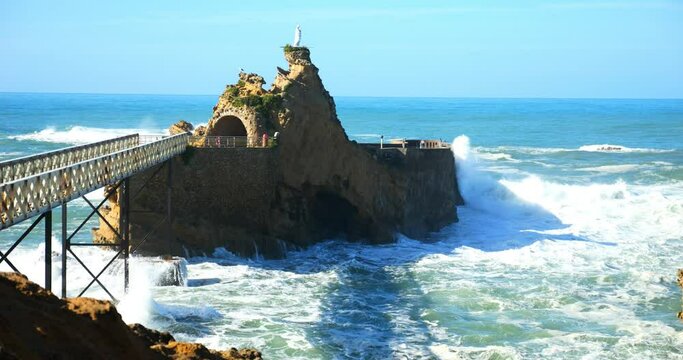 Waves crashing on the famous "Rocher de la Vierge" in the city of Biarritz in southwestern France (in slow motion)