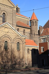Fototapeta na wymiar Amsterdam Sint-Agnes Kerk Church Exterior Detail with Tower, Netherlands