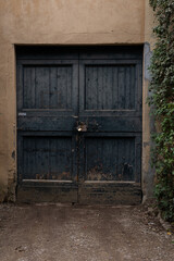 old dark grey wooden door with lock, background, texture, antique