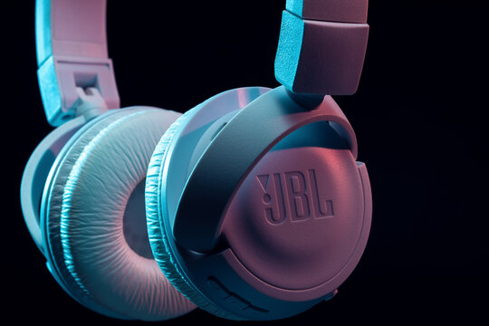 USINSK, RUSSIA - MAY 5, 2022:Close-up of JBL wireless Bluetooth headphones on a black background