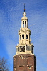 Fototapeta na wymiar Amsterdam Montelbaanstoren Tower Close Up with Blue Sky, Netherlands