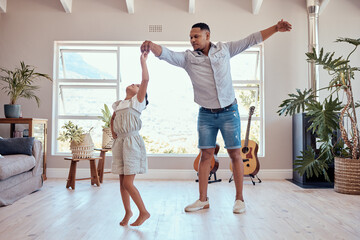 Father, daughter and dancing in living room family home with energy, freedom and fun, relax and...